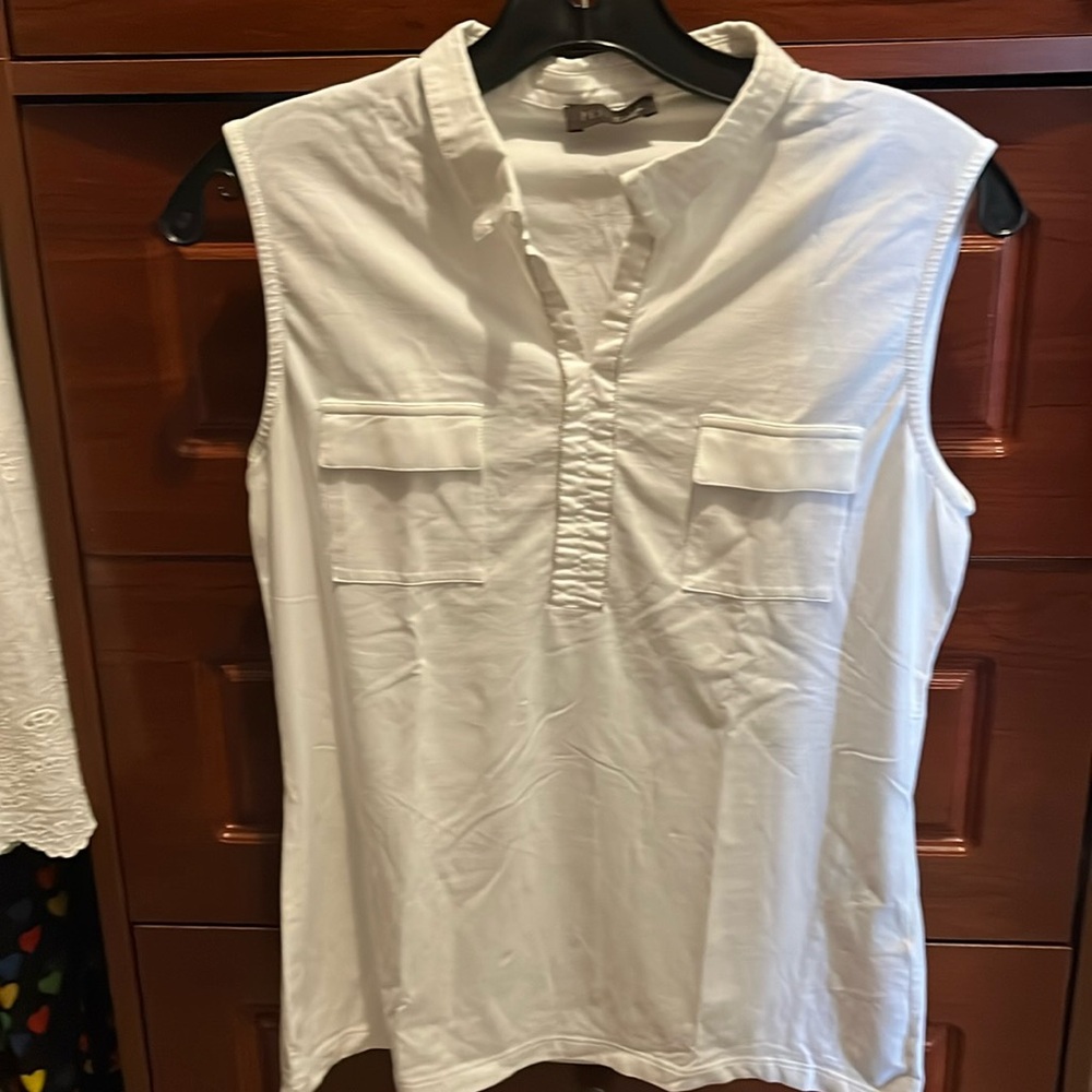 sleeveless collared white shirt with beaded detail on placket